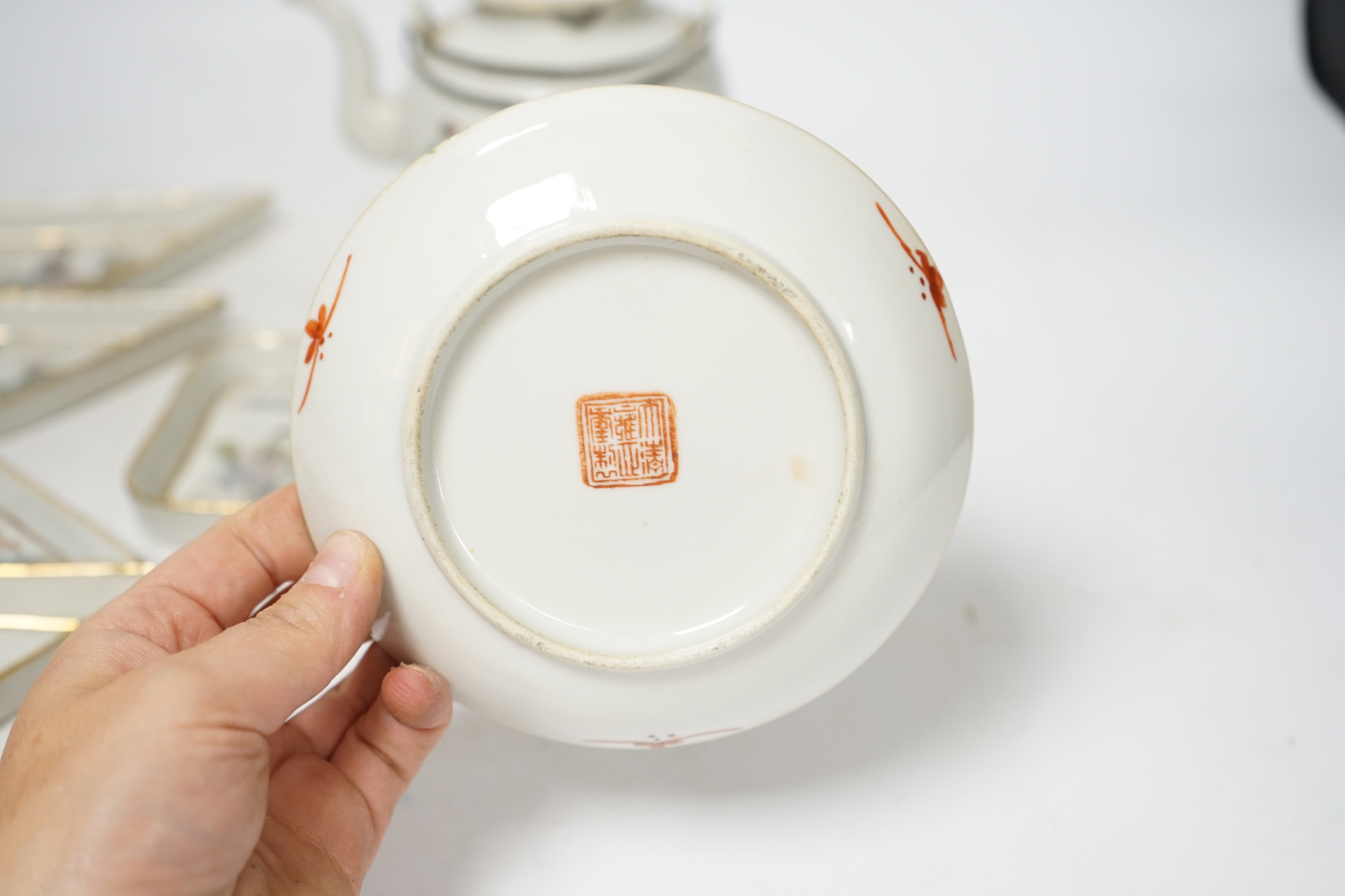 Chinese ceramics to include a teapot and a set of five dishes, 19th/20th century, largest 15cm wide. Condition - poor